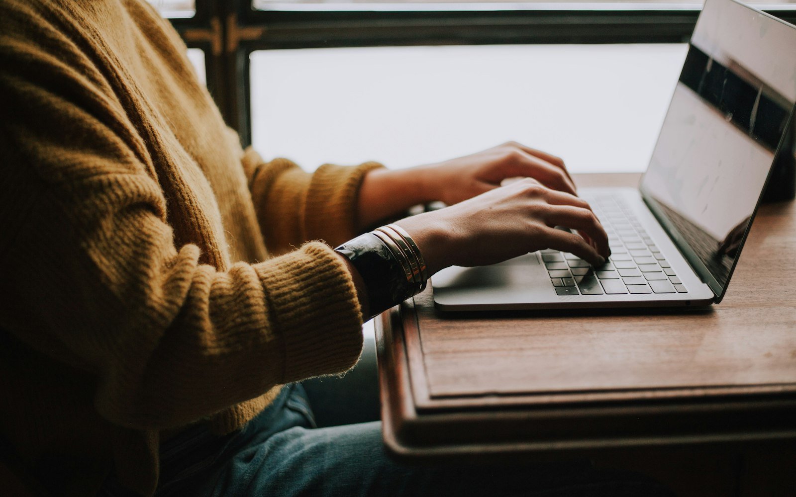 A person working at a laptop