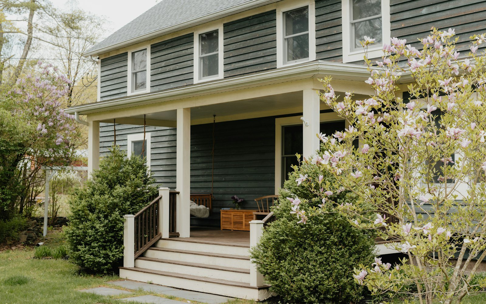 House with a covered porch and steps to the front door